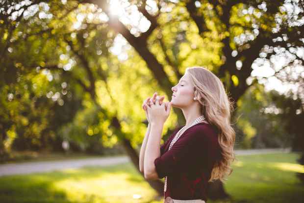 A Woman Praying to God