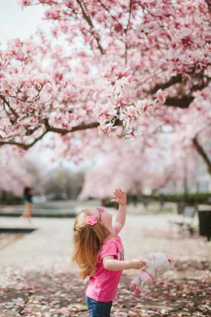 Young girl looking upward with joy