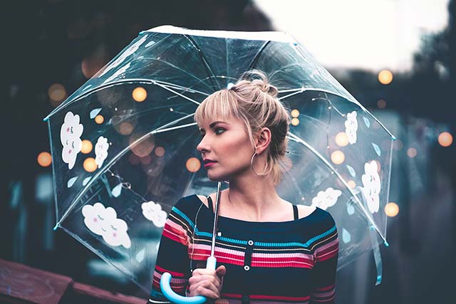 Woman under umbrella