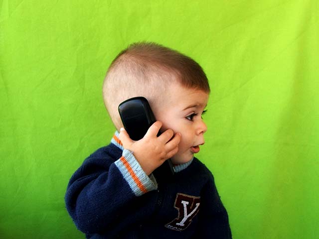 Boy talking on phone