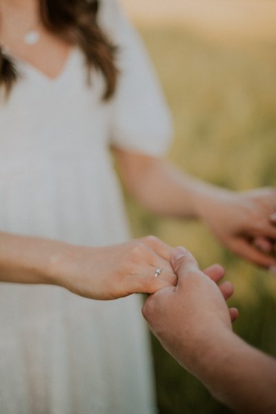 Woman holding hands