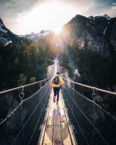 Man crossing a bridge