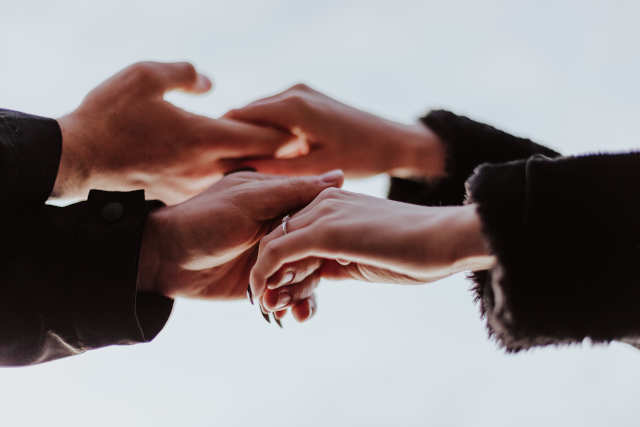 Holding hands for prayer