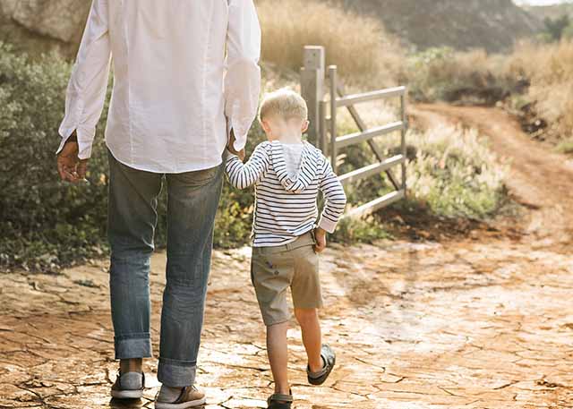 Man and son walking on path - coincidence 